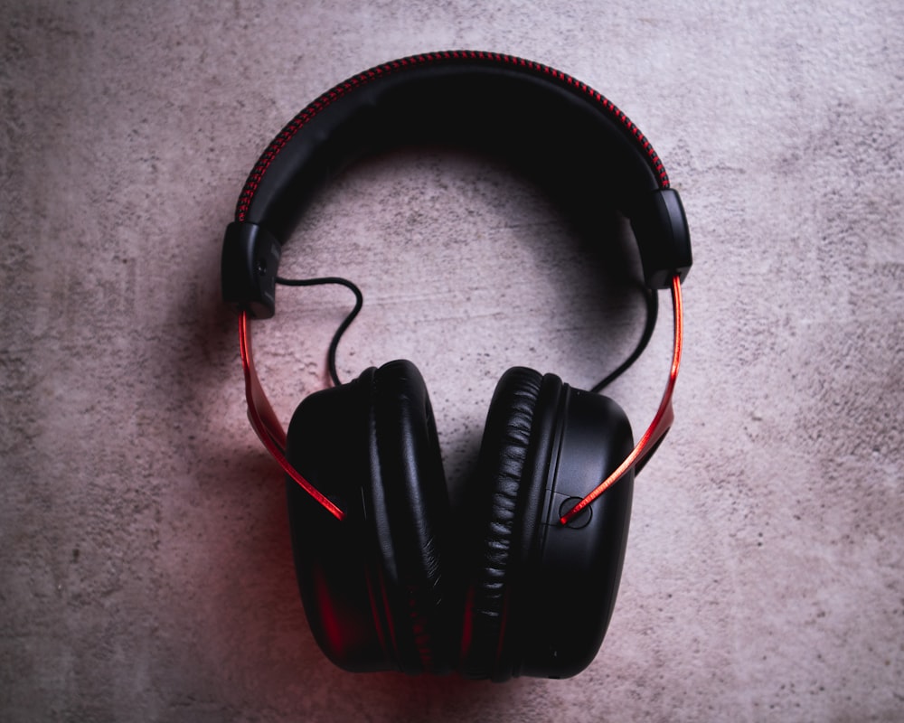 black and red corded headphones