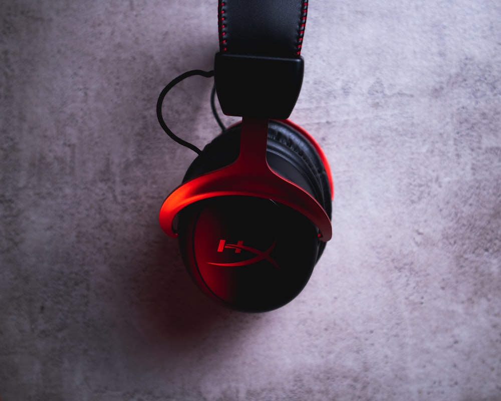 black and red corded headphones