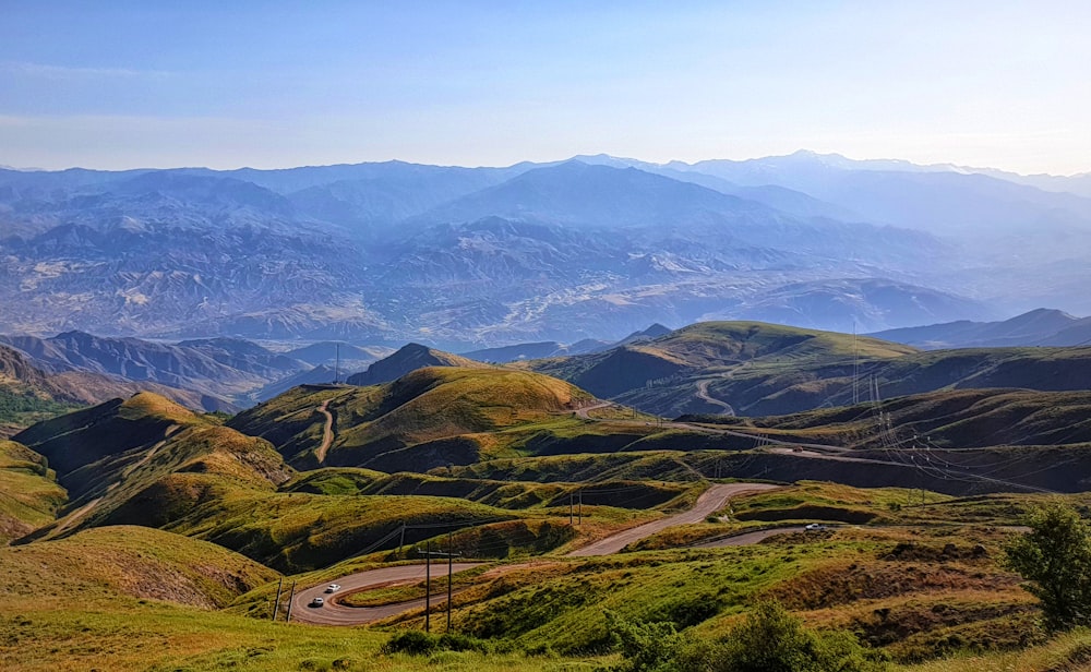 green and brown mountains under blue sky during daytime