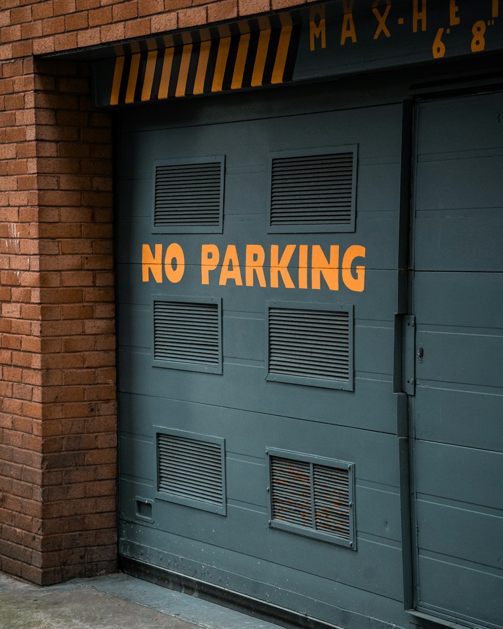 there is a no parking sign on the garage door