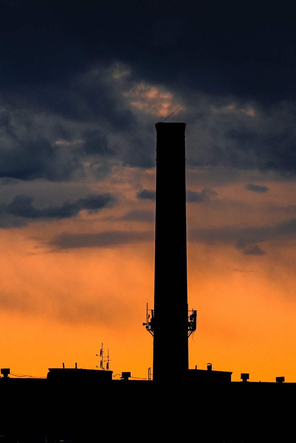 silhouette of tower during sunset