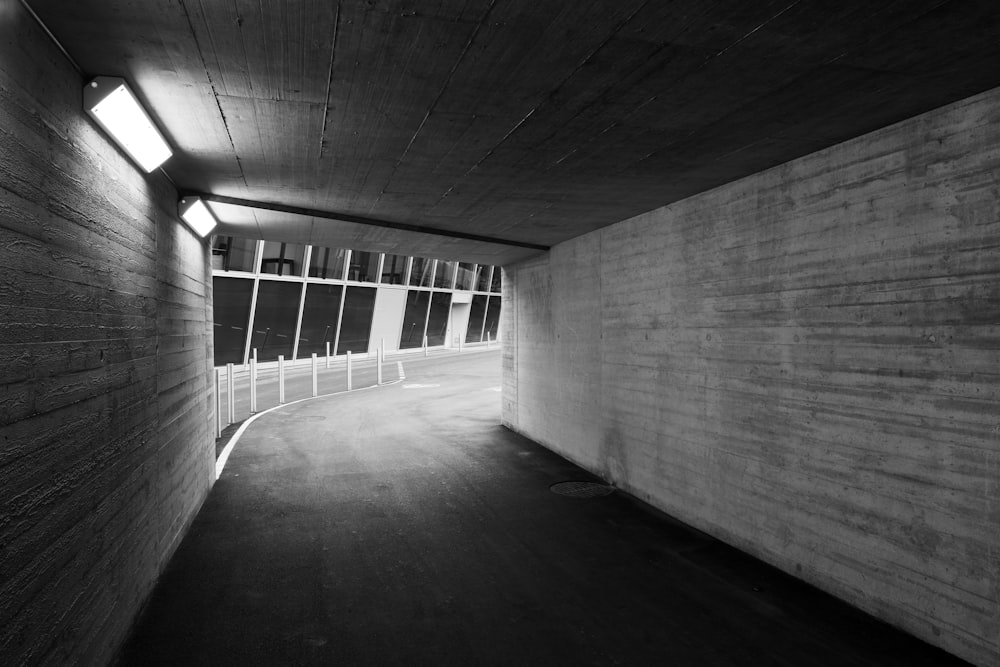 grayscale photo of empty hallway