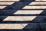 shadow of person on gray concrete pavement