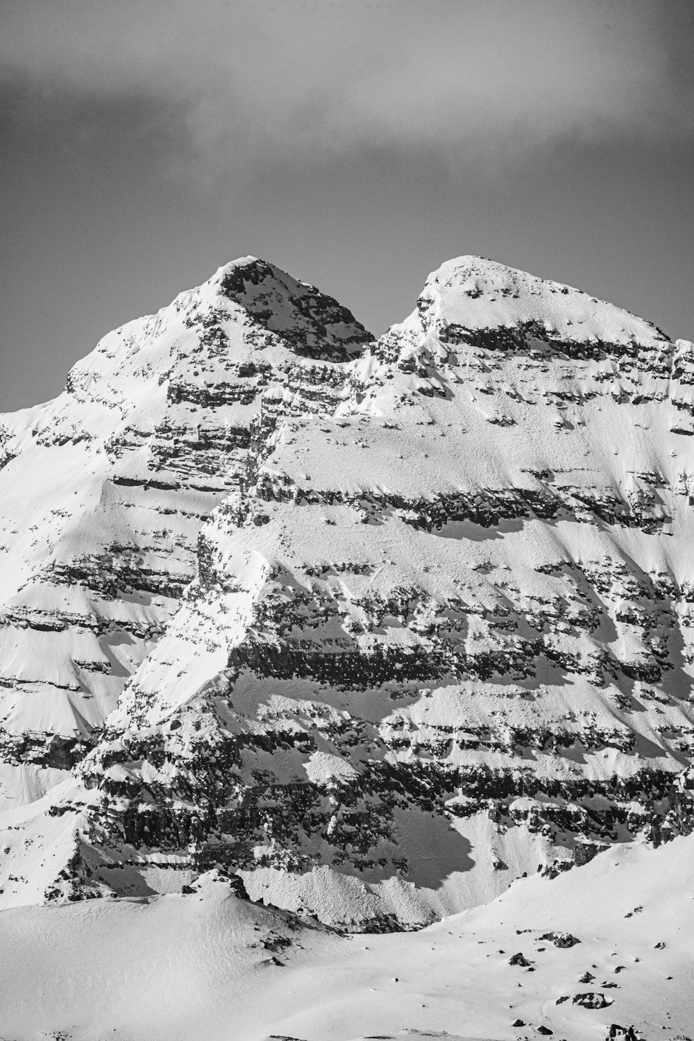 snow covered mountain during daytime