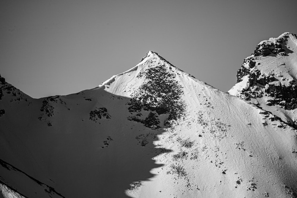 grayscale photo of snow covered mountain