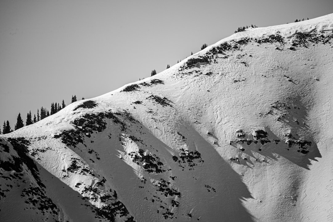 snow covered mountain during daytime