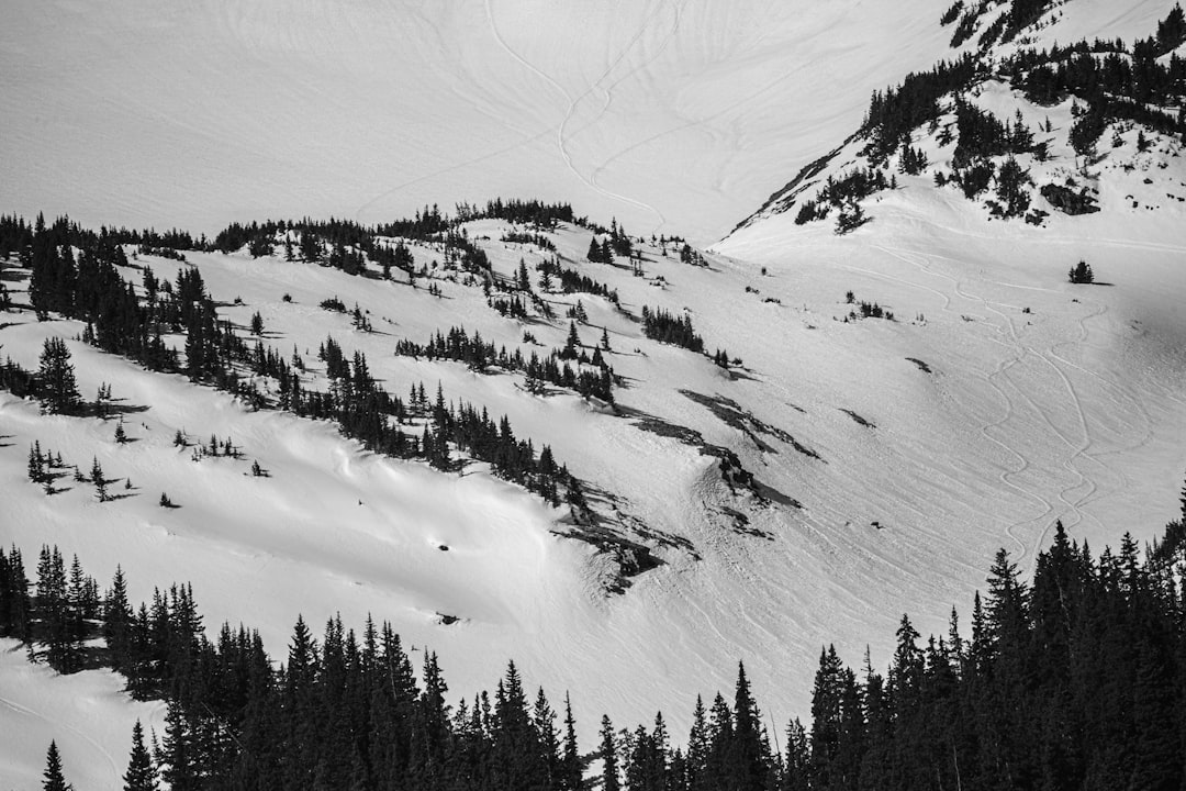 snow covered mountain during daytime