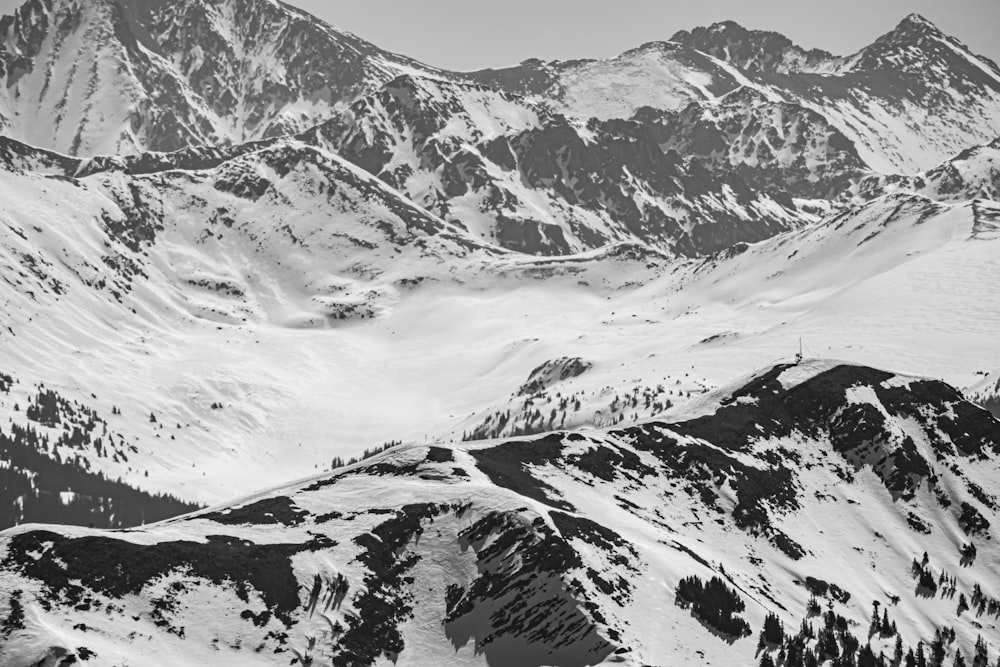 grayscale photo of snow covered mountain