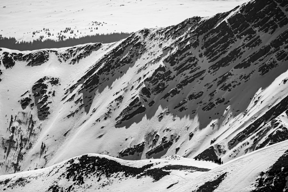 snow covered mountain during daytime