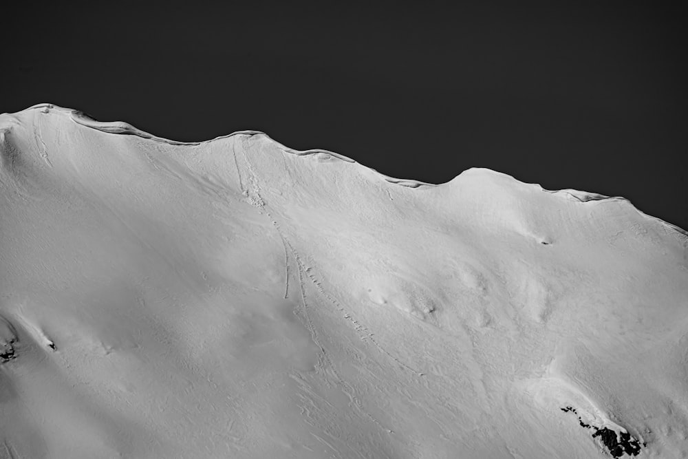 snow covered mountain during daytime