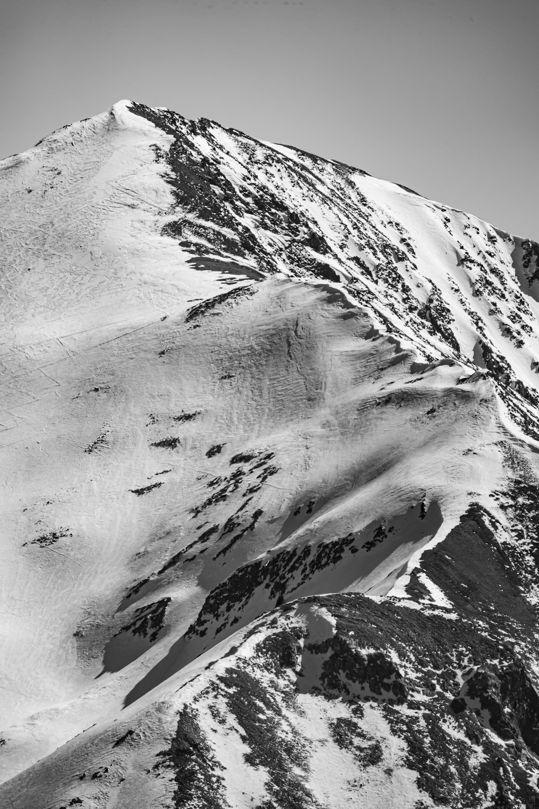 snow covered mountain during daytime