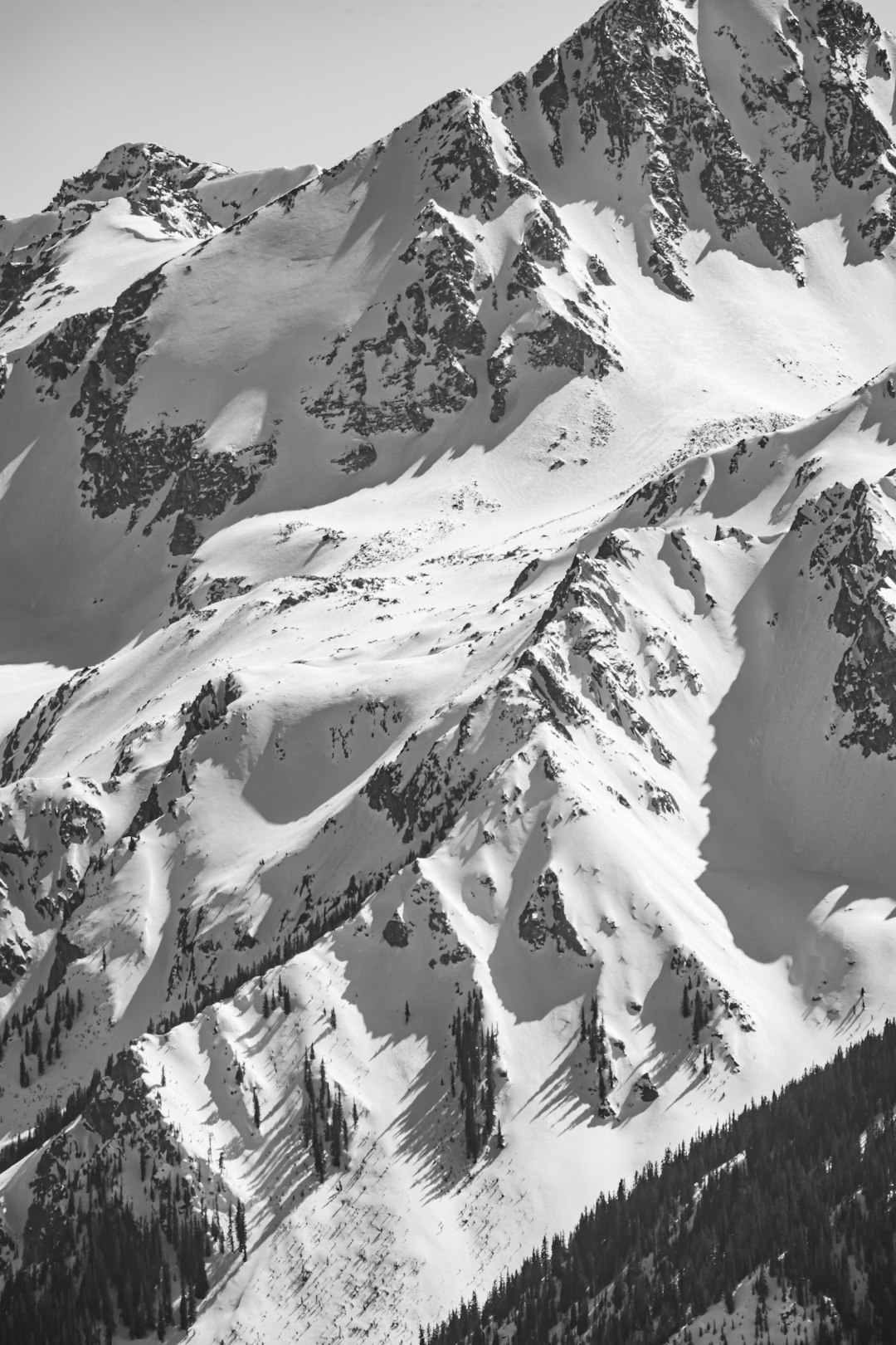 snow covered mountain during daytime