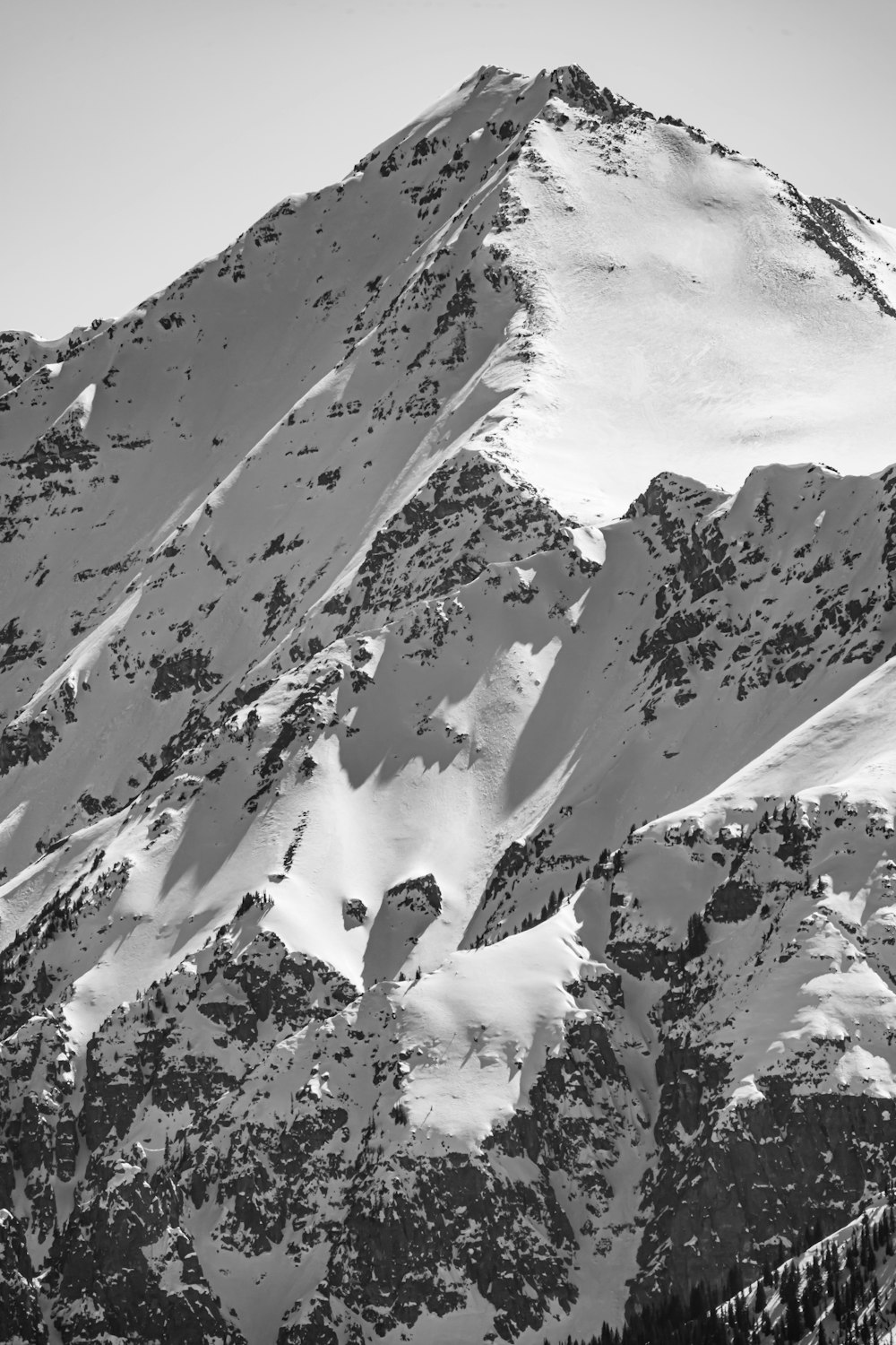 snow covered mountain during daytime