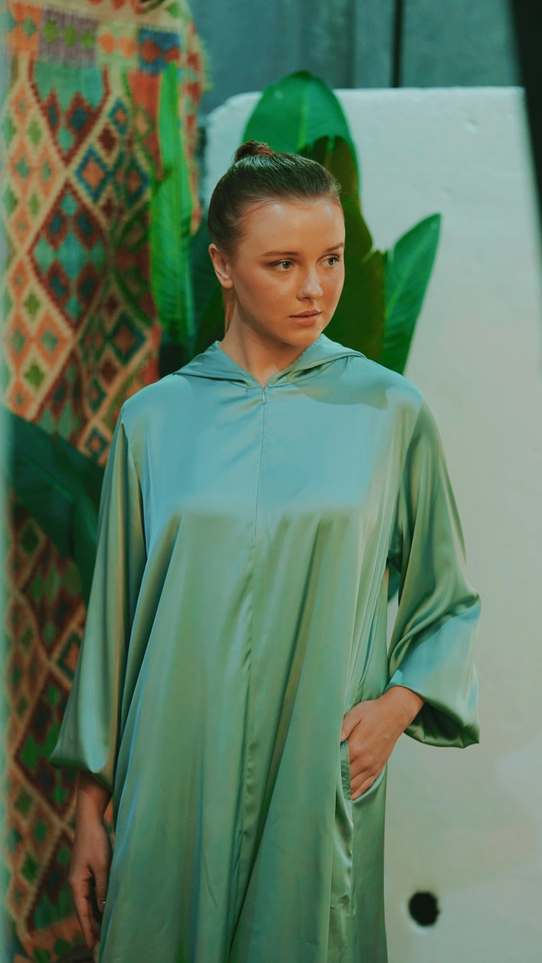 woman in green long sleeve dress