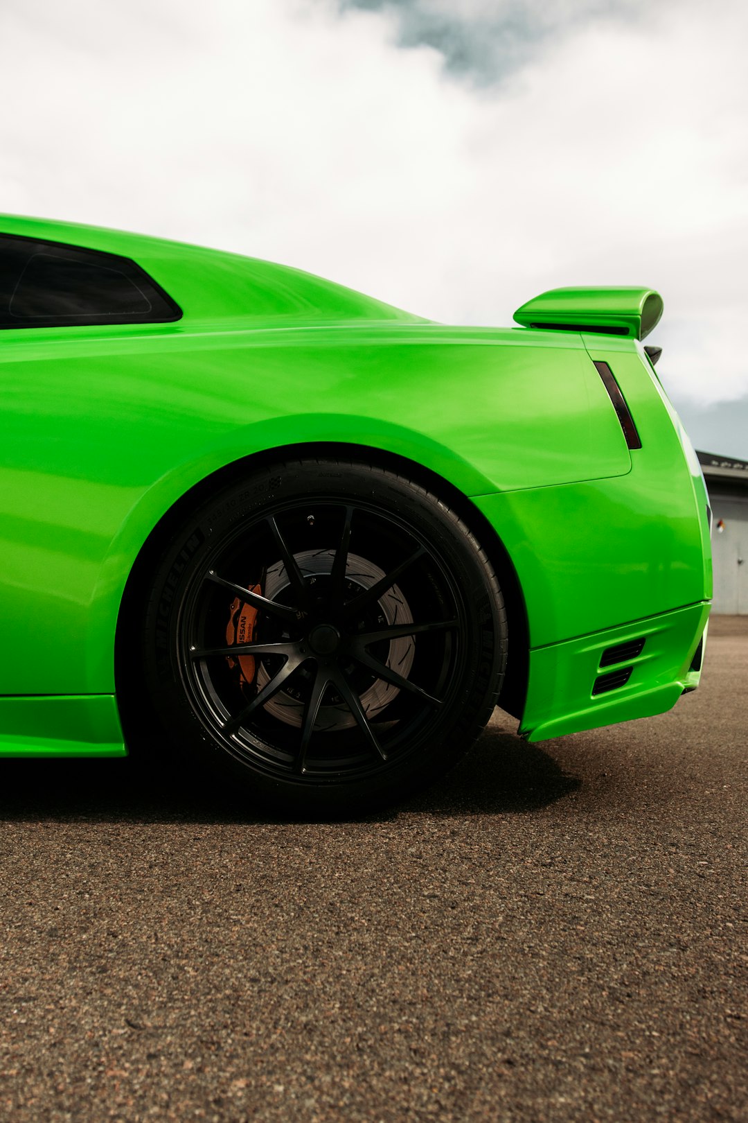 green and black sports car
