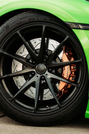 black and silver multi spoke car wheel