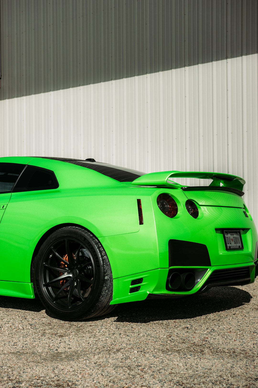 green ferrari 458 italia on white background