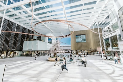 people sitting on chairs inside building