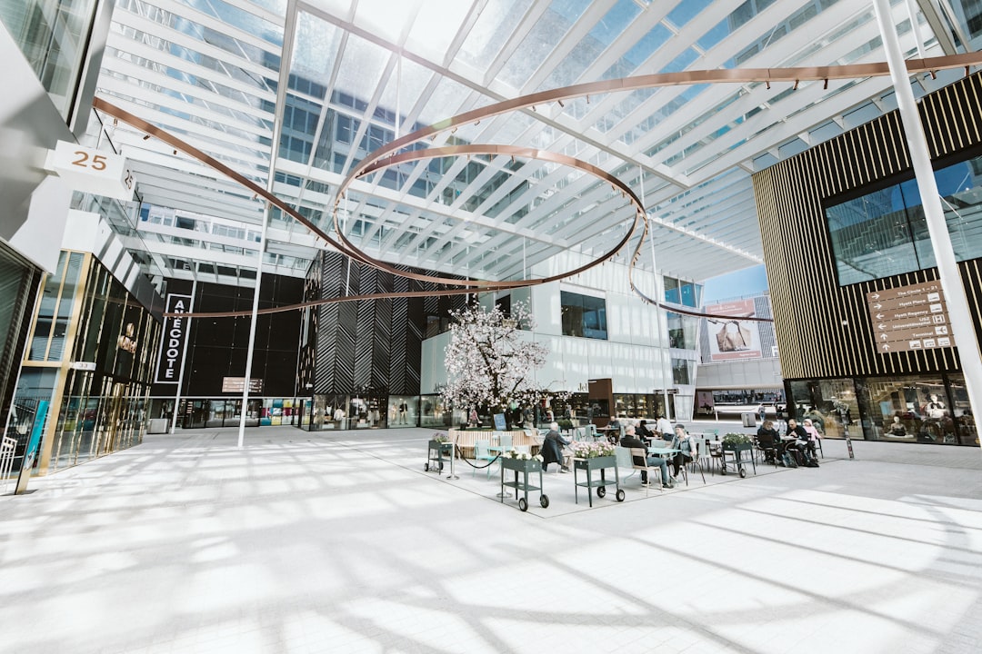 people sitting on chairs inside building