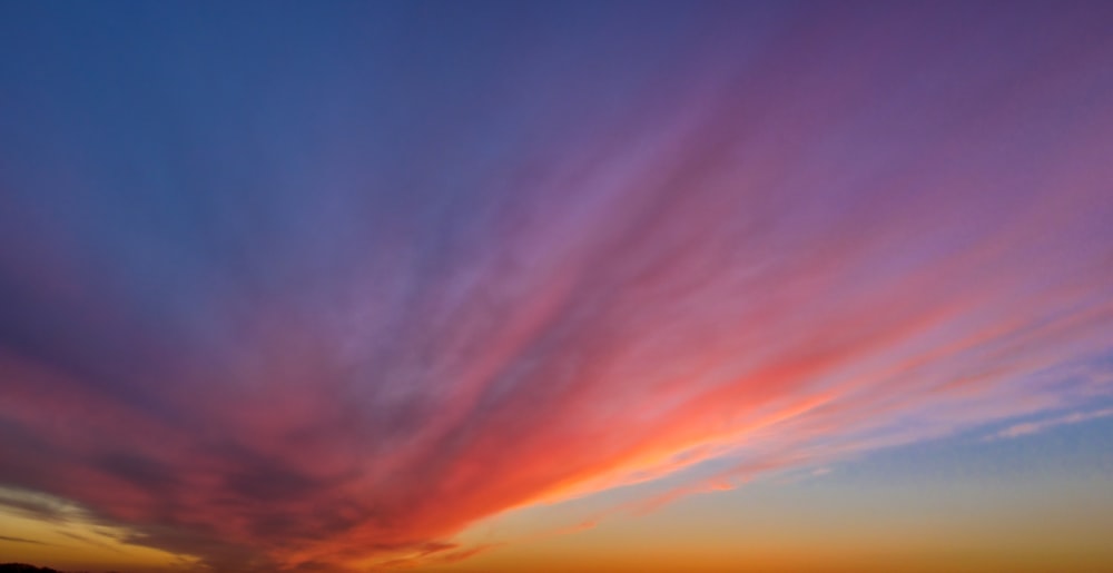 blue and orange sky during sunset