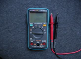 black and red multimeter