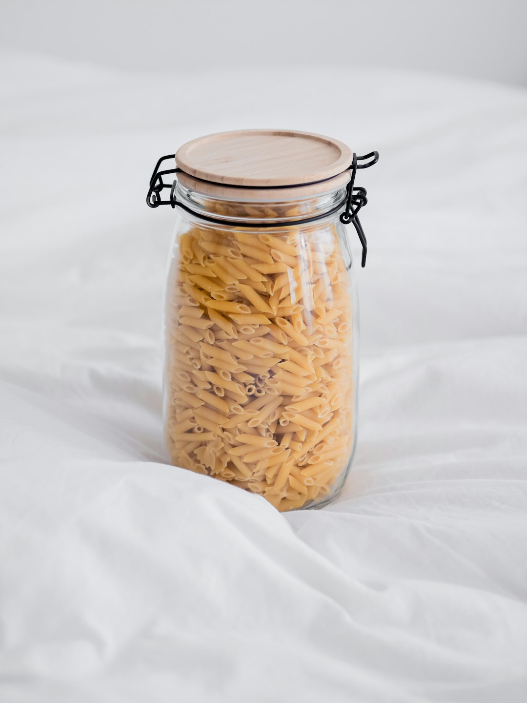 clear glass jar with white powder inside