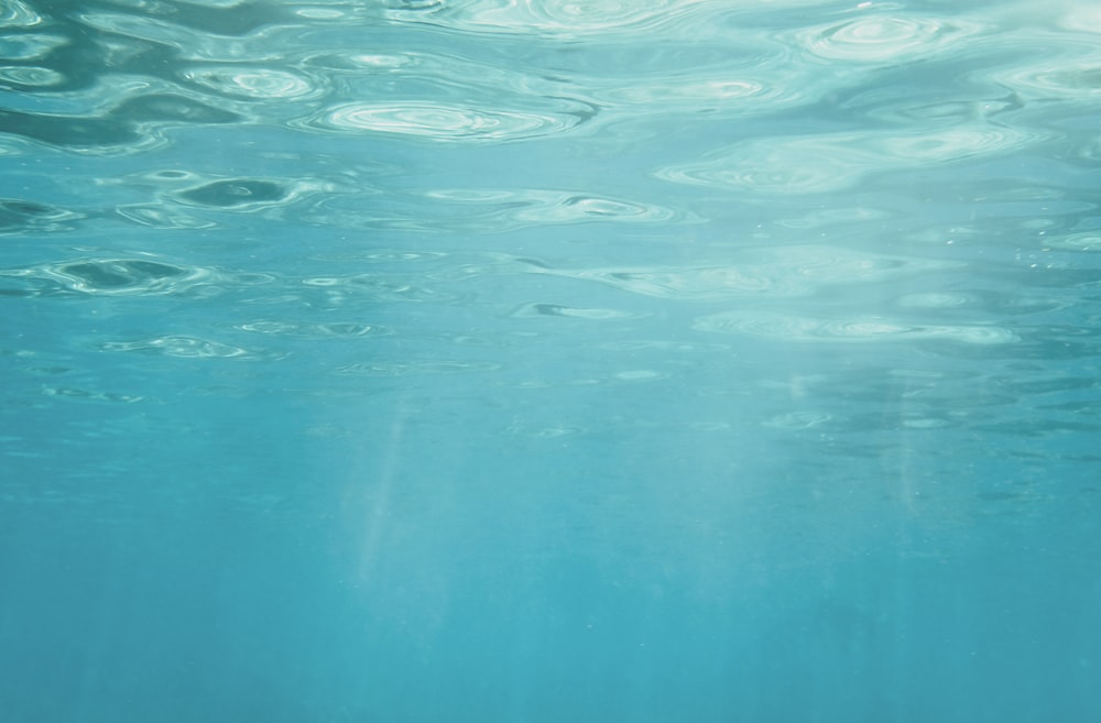 blue water with white bubbles