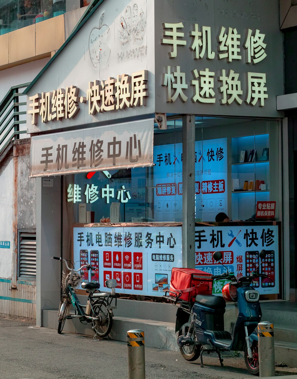 black motorcycle parked beside store