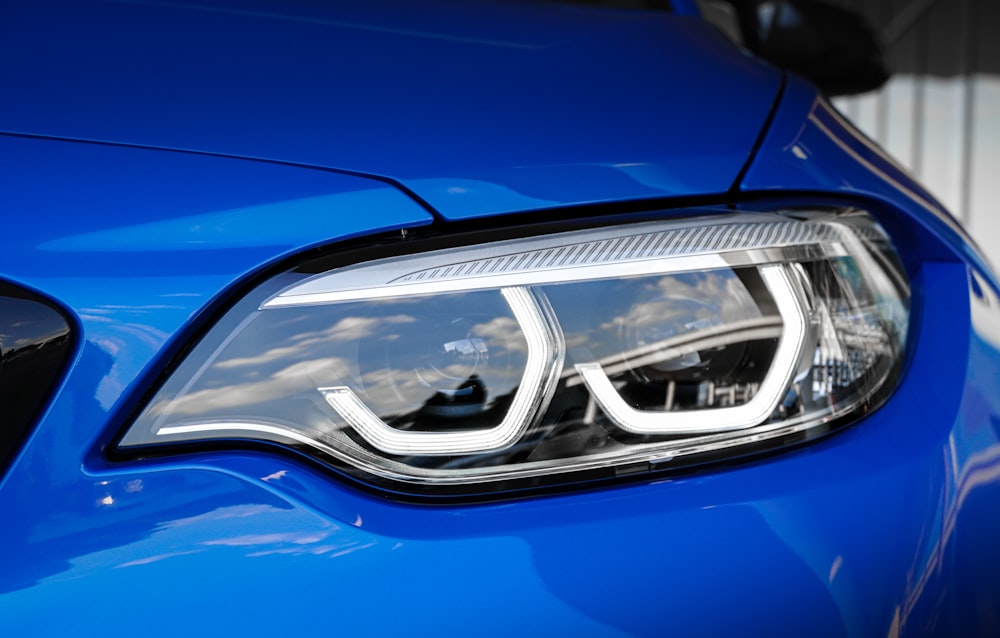 blue car with white and black car door