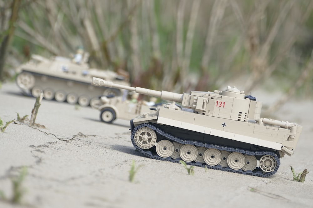 brown battle tank on snow covered ground