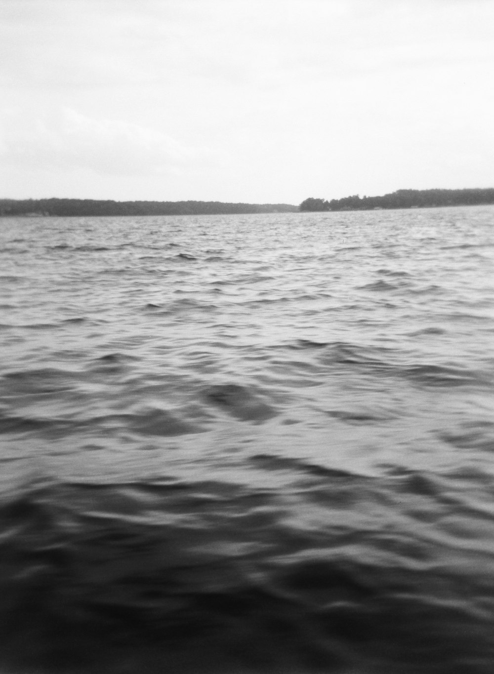 grayscale photo of body of water