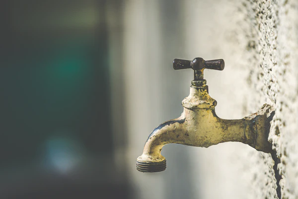 Water leaking and dripping from a tap in Kuala Lumpur
