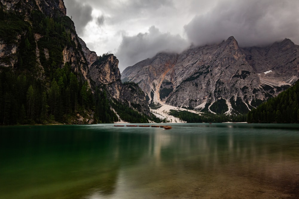 lake in the middle of mountains