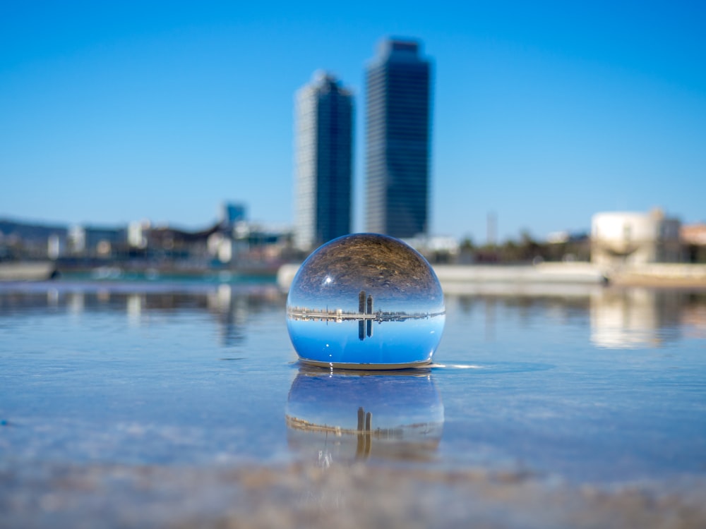 clear glass ball on water