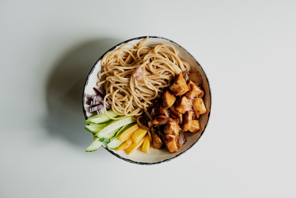 pasta dish on white ceramic bowl