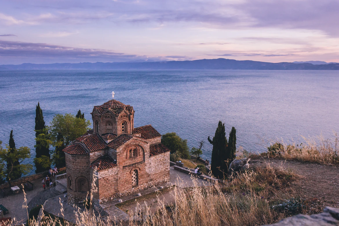 Historic Orthodox Church overlooking Lake Ohrid at sunset