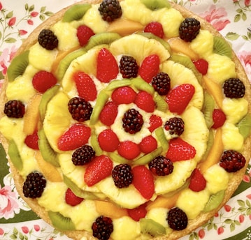 strawberry and banana fruit on white ceramic plate