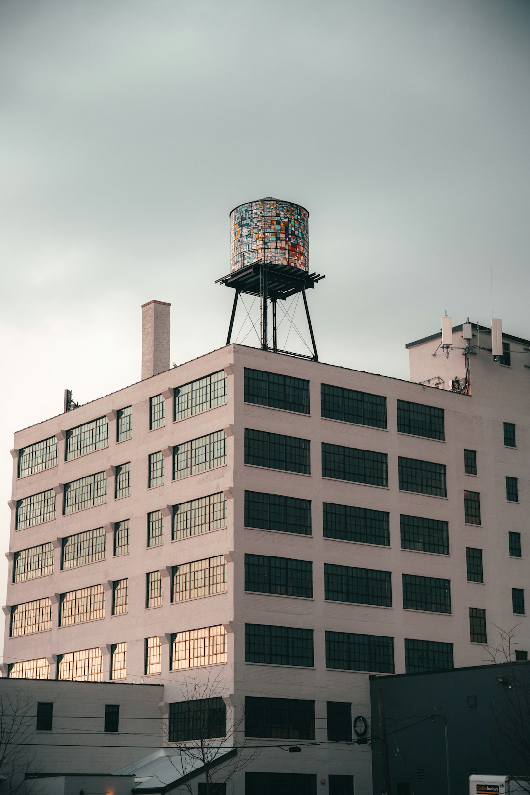 white concrete building under gray sky during daytime