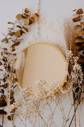 brown and white round mirror