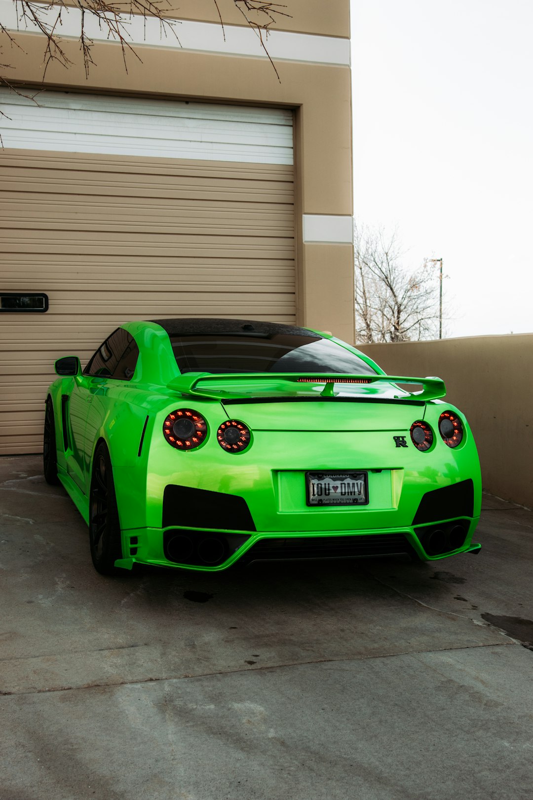 green bmw m 3 parked in garage