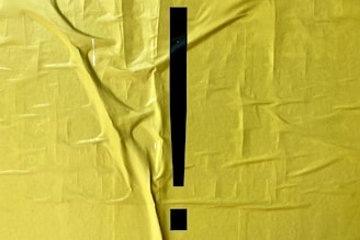 white textile with black cross