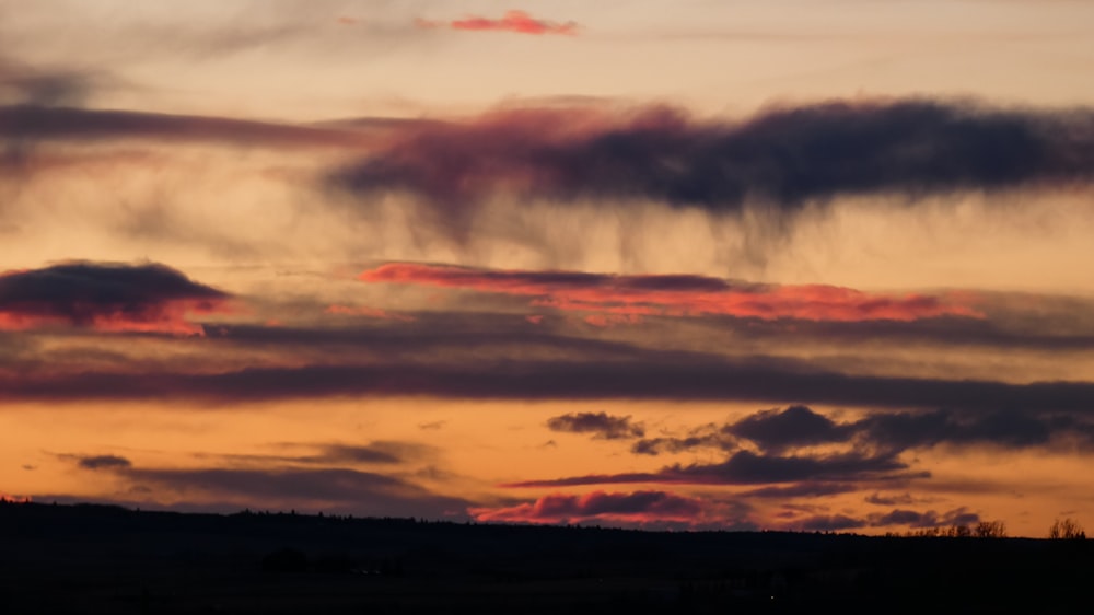 white clouds during golden hour