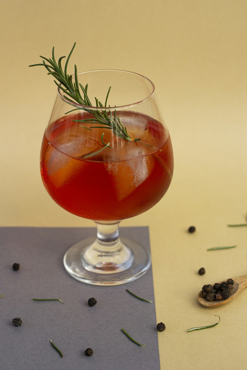 clear wine glass with red liquid