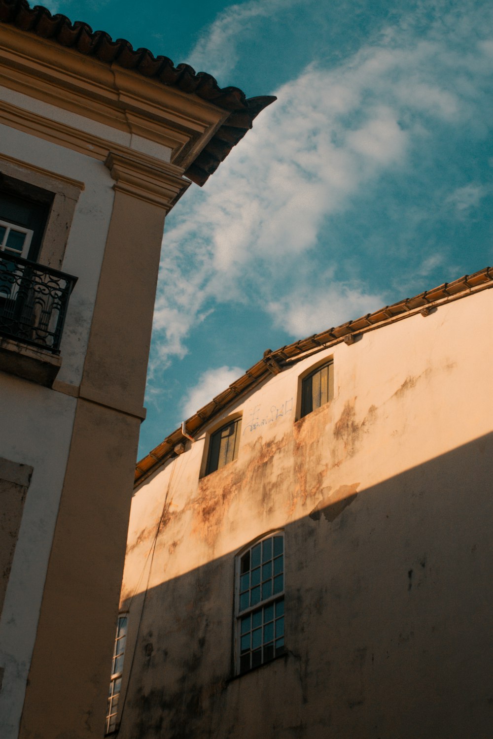 white concrete building under blue sky during daytime