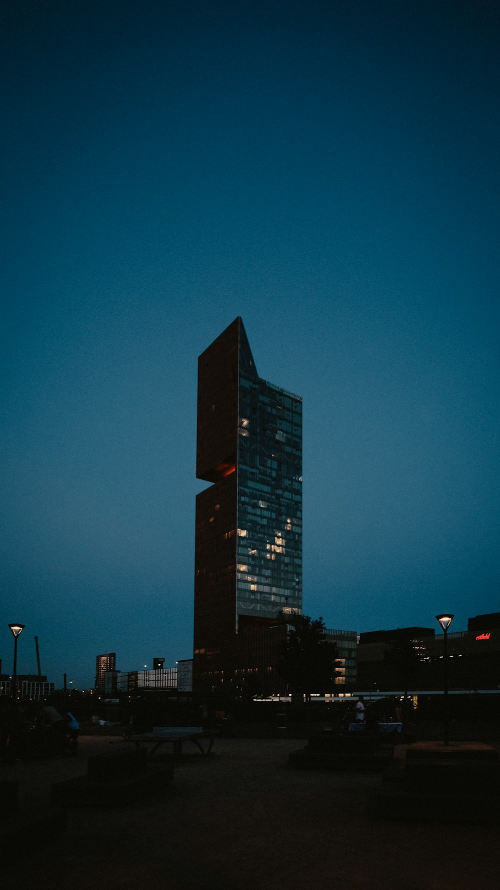 black high rise building during night time