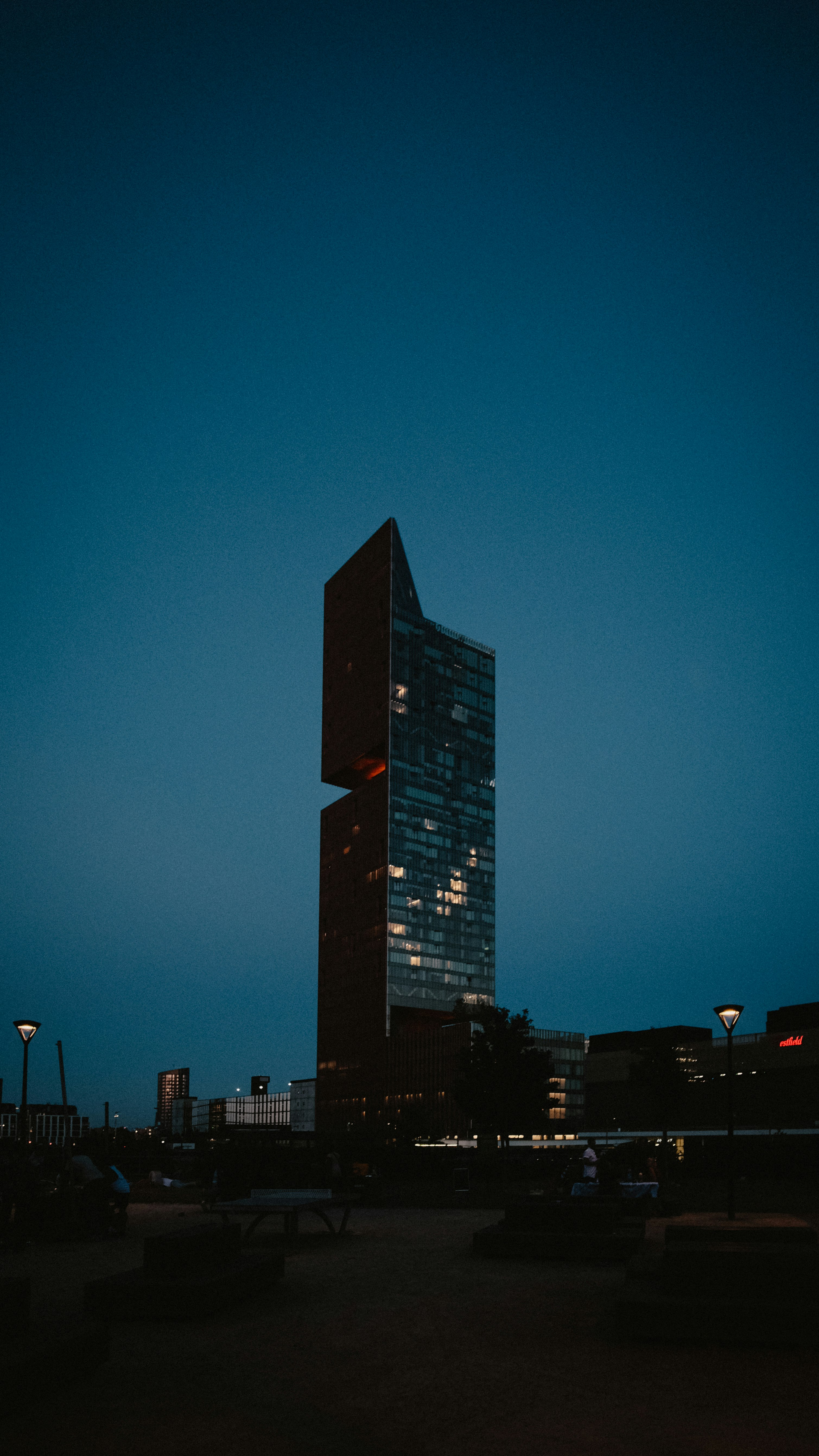 black high rise building during night time