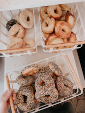 brown doughnuts on white plastic container