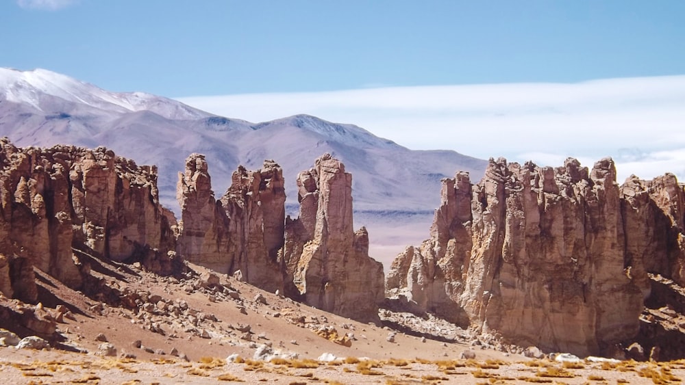 brown rocky mountain under blue sky during daytime