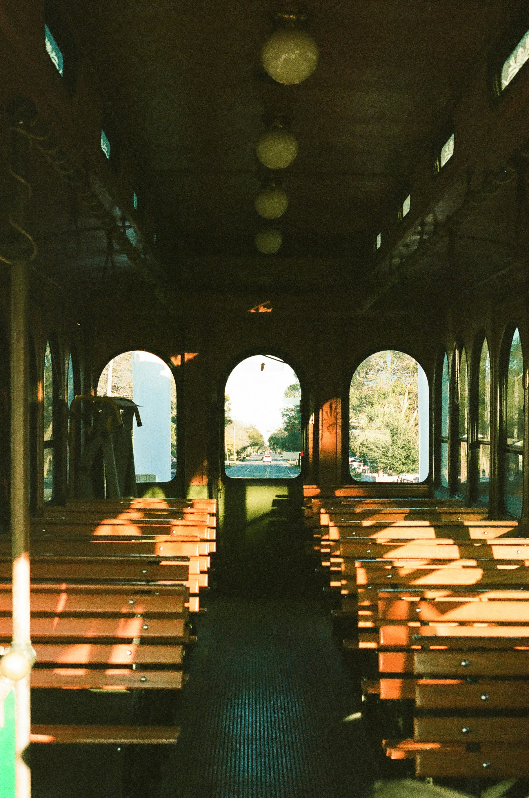 brown wooden benches inside building