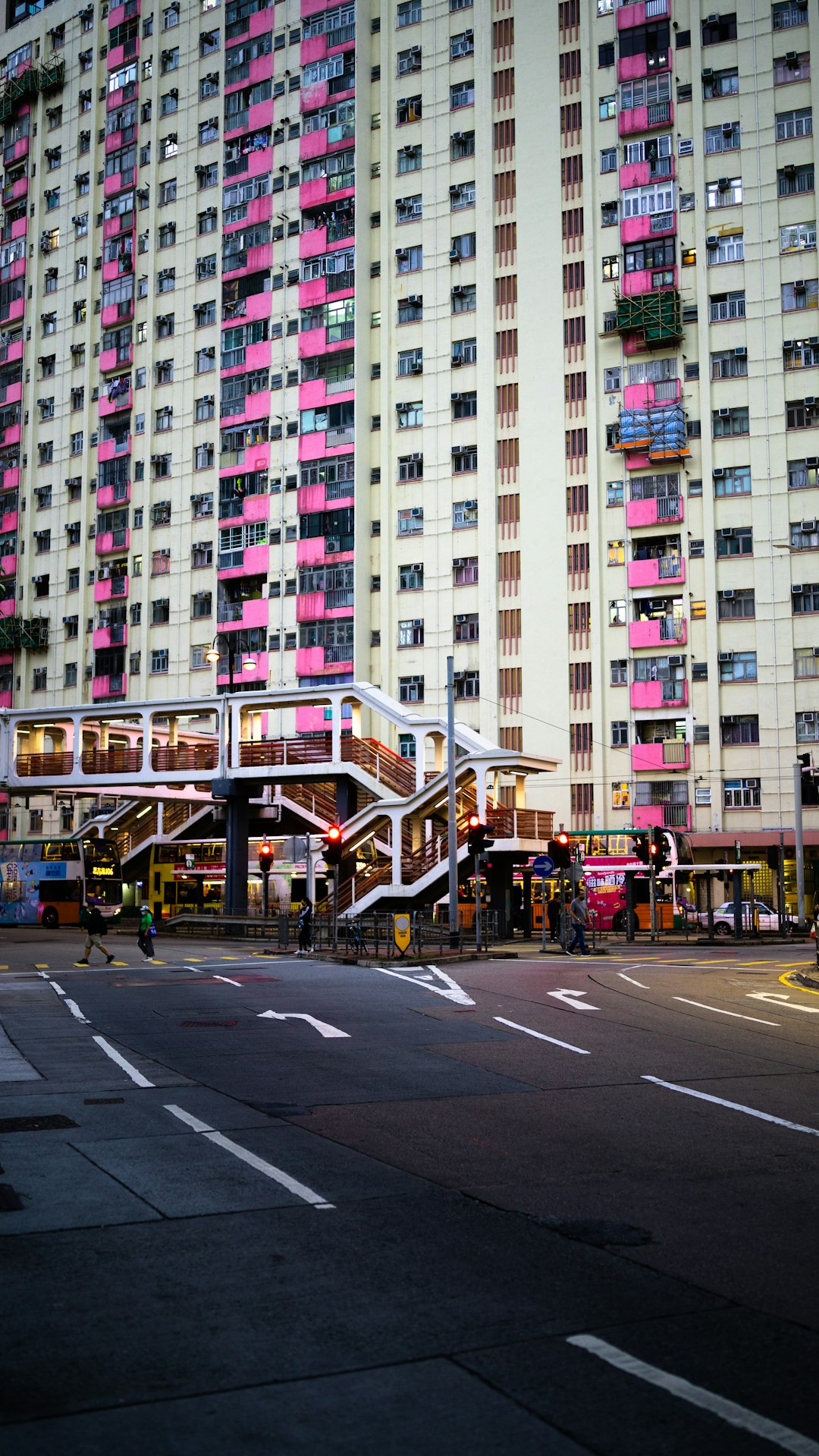 people walking on pedestrian lane near high rise buildings during daytime